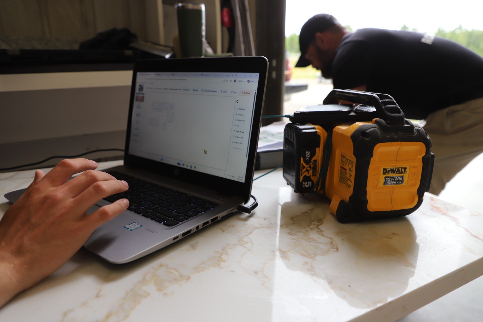Countertop layout being reviewed digitally before fabrication.