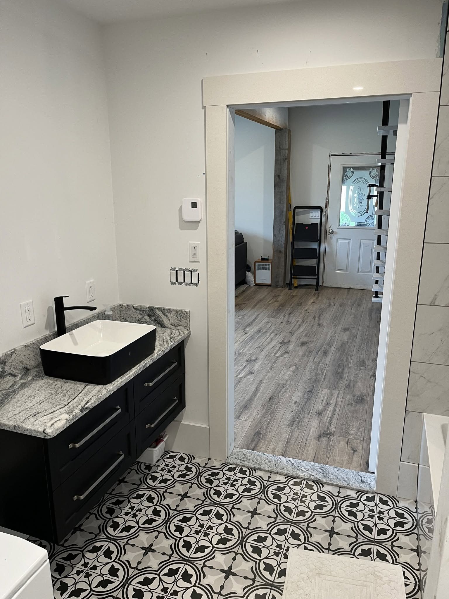 Patterned Stone Bathroom Vanity — Oak Bay Rock & Tile