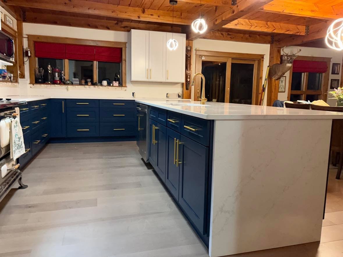 Blue Cabinet Kitchen with White Stone Island — Oak Bay Rock & Tile