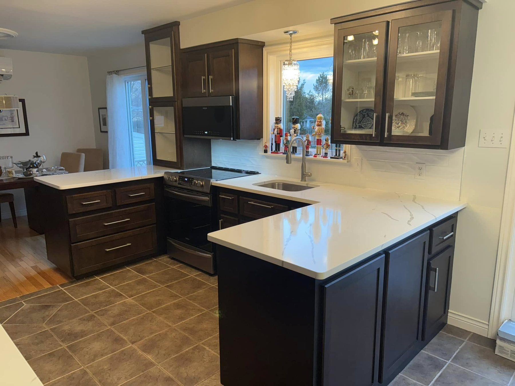 Dark Cabinet Kitchen with Light Countertops — Oak Bay Rock & Tile