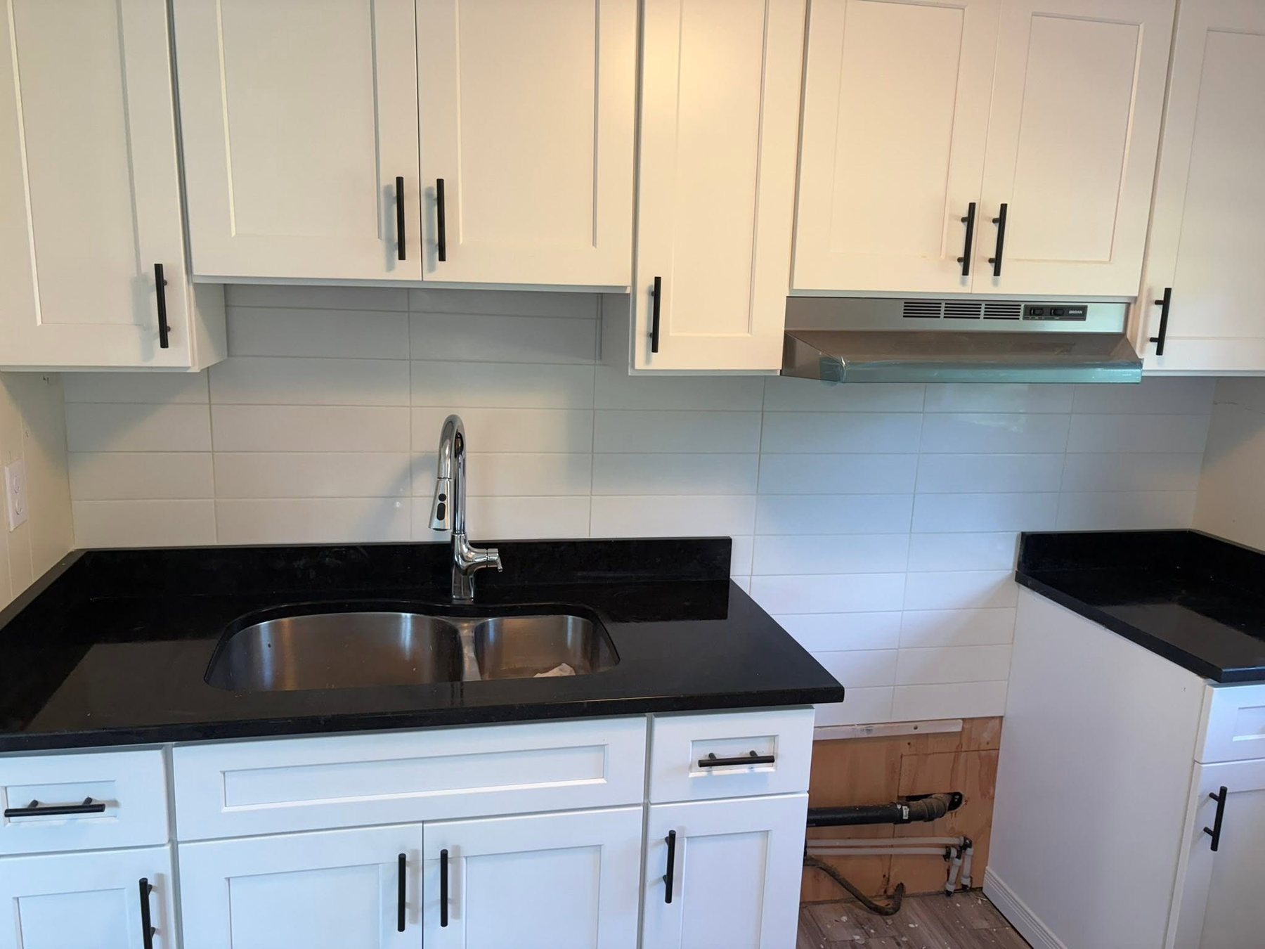 Dark Stone Countertop Installation — Oak Bay Rock & Tile