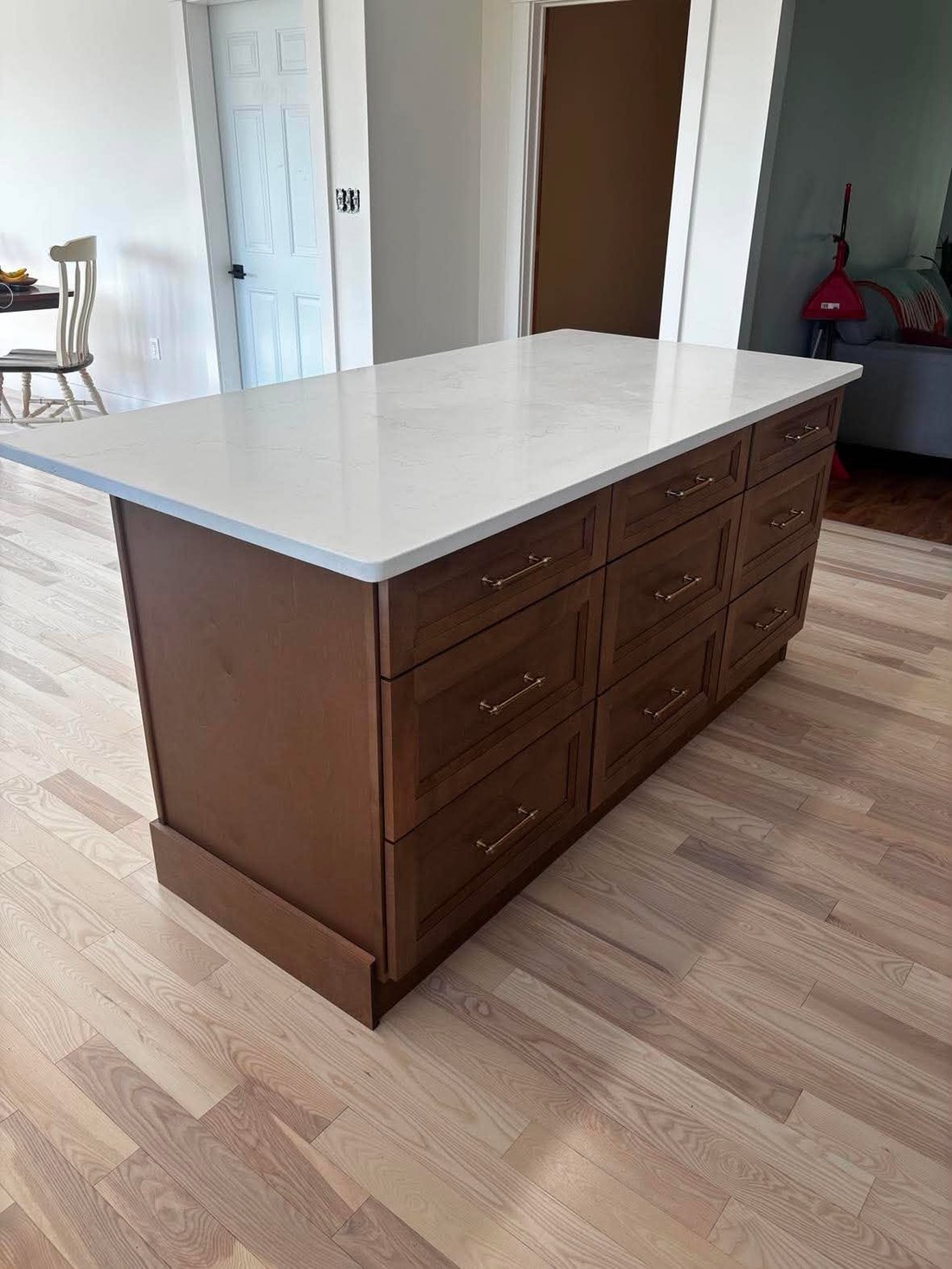 Dark Cabinet Kitchen with Light Countertops — Oak Bay Rock & Tile