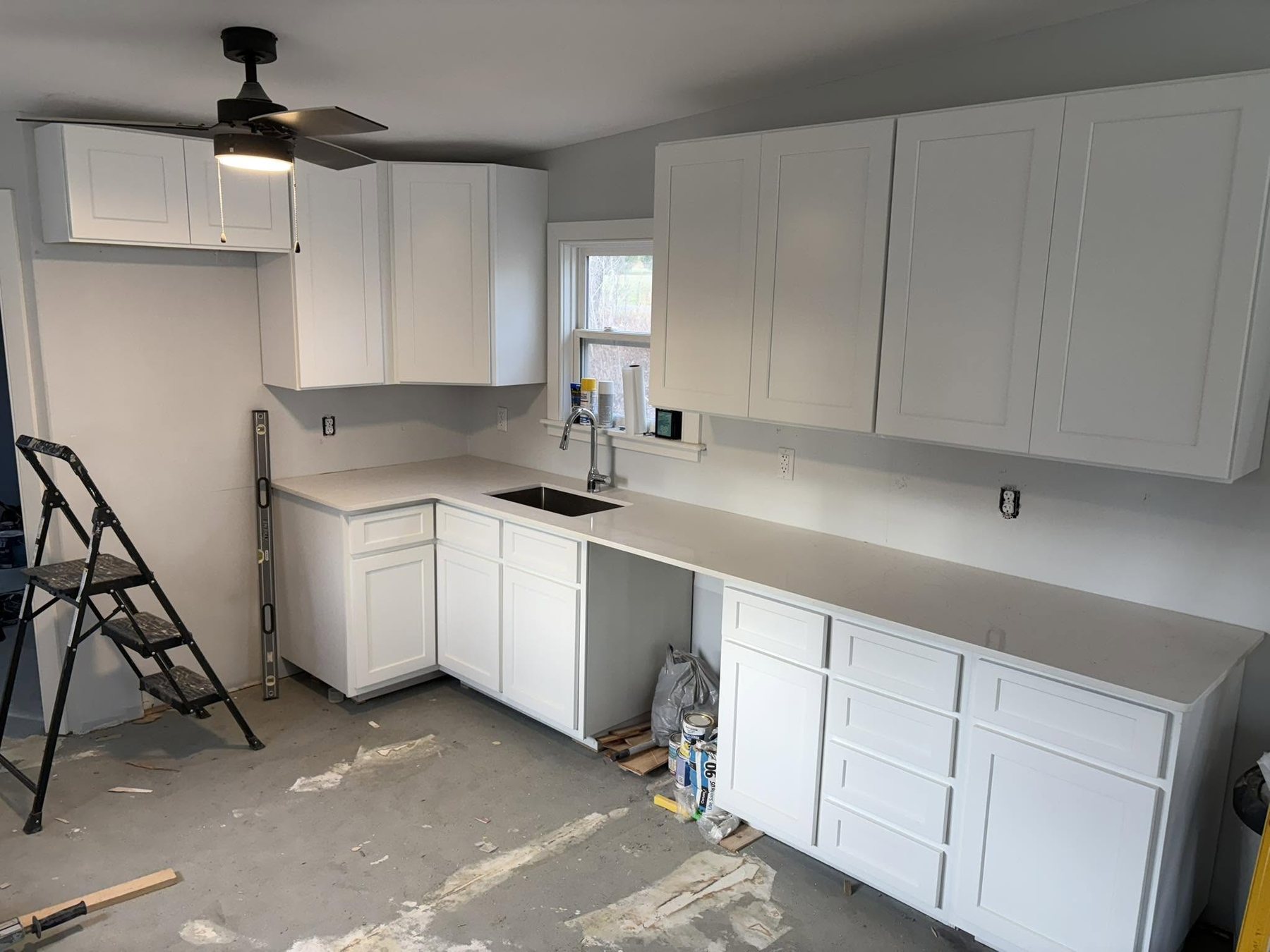 New countertop surfaces being installed.