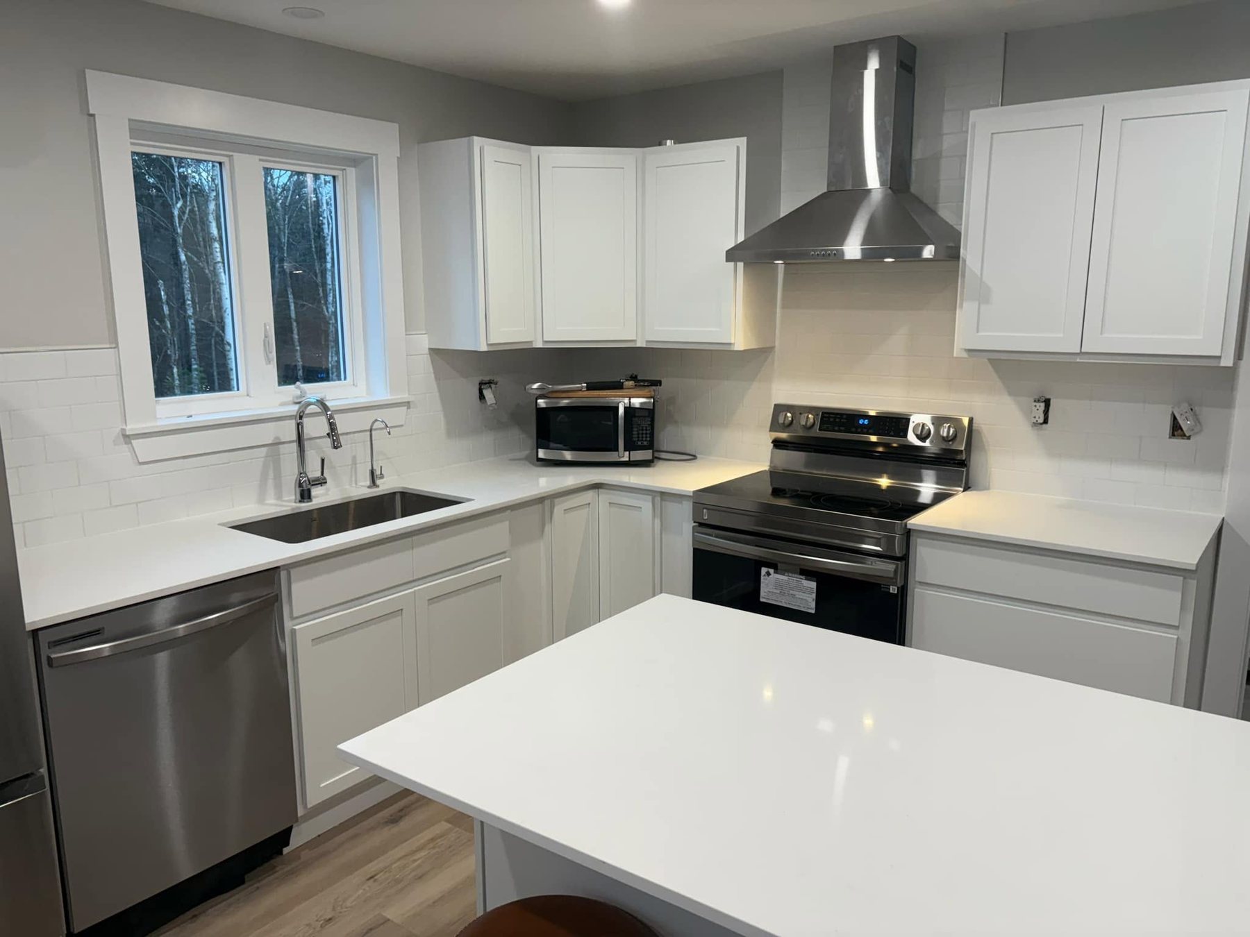 Modern White Kitchen — Oak Bay Rock & Tile