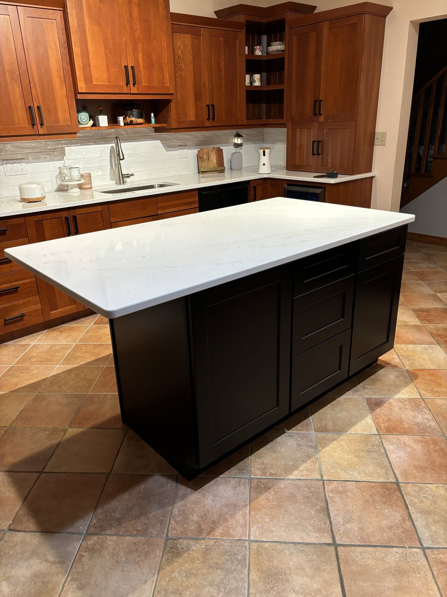 Warm Wood Kitchen with Contrasting Island — Oak Bay Rock & Tile
